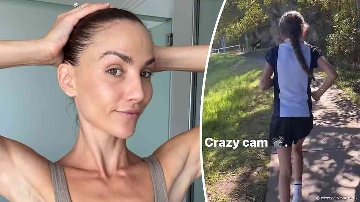 Fitness influencer Rachael Finch comes under fire for screaming and running behind her daughter, 8, to encourage her during school cross-country race: 'Difficult to watch'