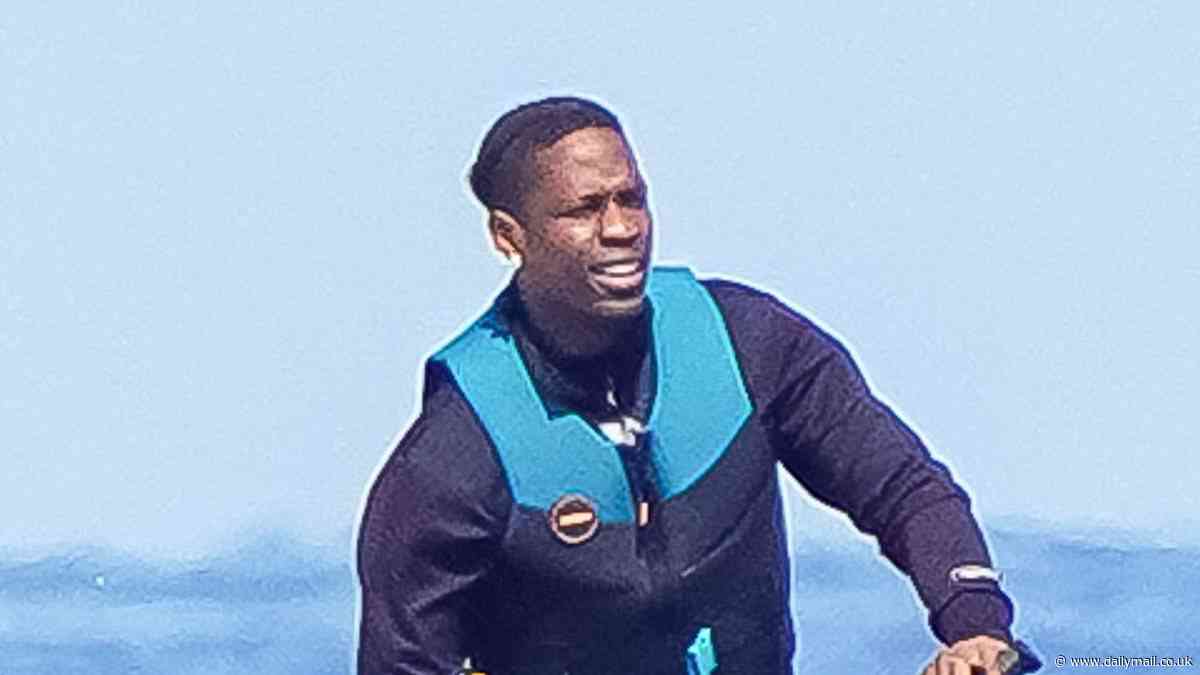 Travis Scott pictured jet-skiing with daughter Stormi, 6, in St. Tropez following Cannes, France melee with Tyga ... as both musical artists formerly dated Kylie Jenner