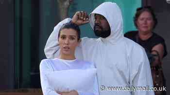 Kanye West's wife Bianca Censori clutches PILLOW over her chest in a thong bodysuit as she revives the daring look during pair's return to Italy
