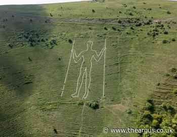 The Long Man of Wilmington in Sussex has been repainted