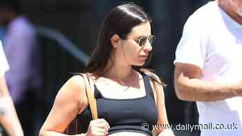 Pregnant Lea Michele shows off her burgeoning baby bump in a sporty set as she grabs lunch at Locanda Verde in New York