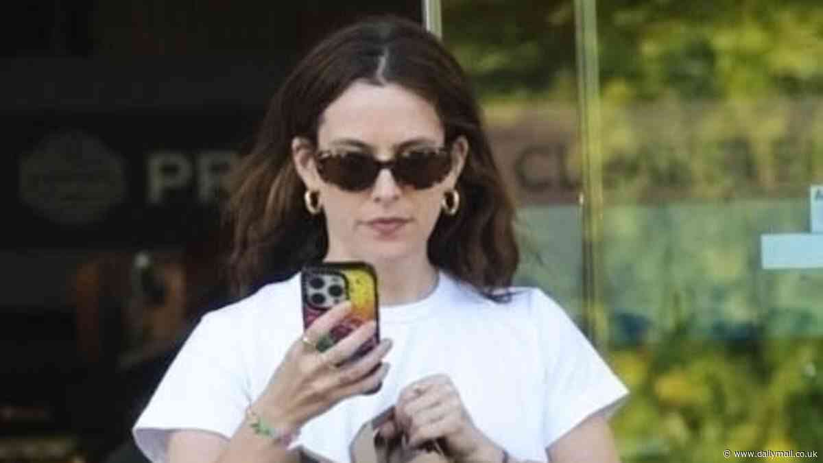 Riley Keough steps out to grab a smoothie - after helping to thwart attempts from 'Nigerian scammers'  plotting to sell Graceland out from under Elvis Presley's family
