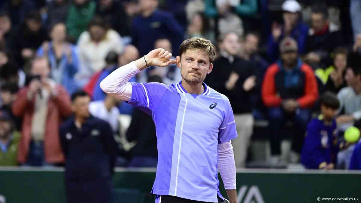 Belgian tennis star David Goffin accuses fans of SPITTING at him during French Open - as he hits out at 'hooligans' who 'totally disrespected' him in five-set epic