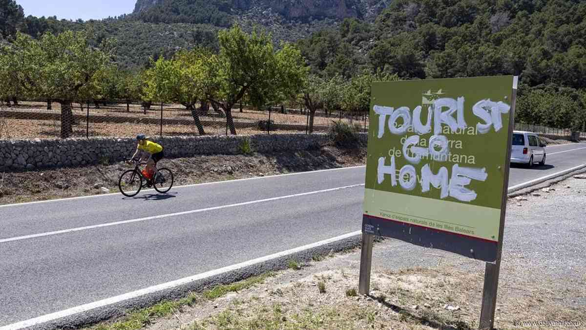 Campaigners threaten to bring Mallorca airport to a standstill over the summer - causing havoc for British families - in latest anti-holidaymaker protest, as fresh 'Tourists go home' graffiti spreads on the island