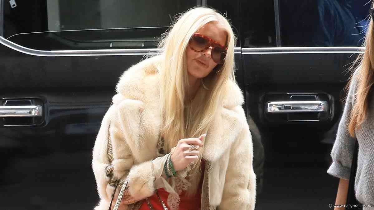 Jessica Simpson looks thinner than ever in a vintage faux fur coat while catching a flight out of Los Angeles as she maintains 100-lb weight loss