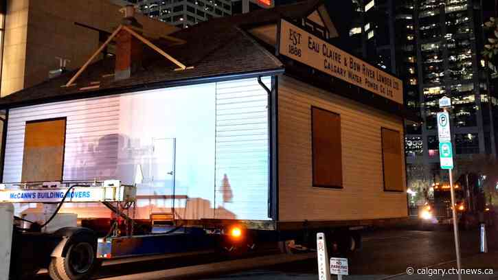 Calgary's historic Eau Claire and Bow River Lumber building moved to permanent location