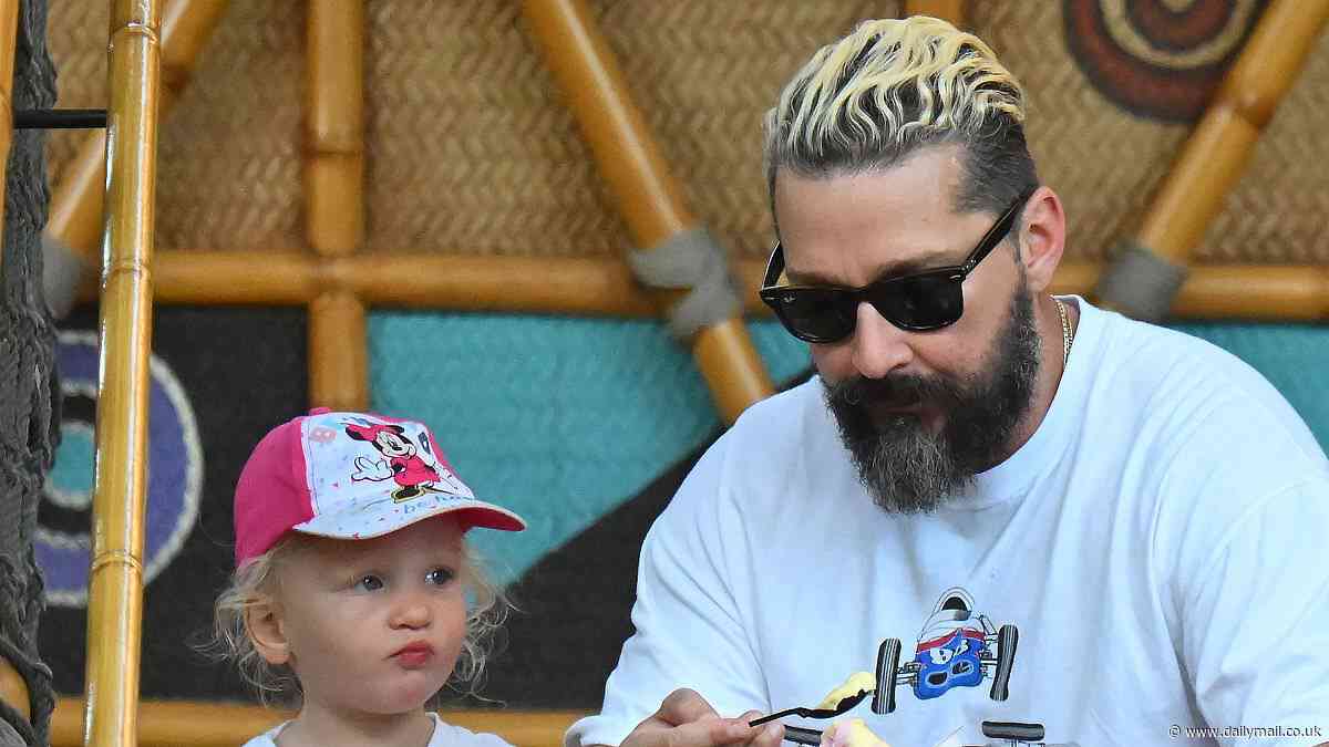 Shia LaBeouf dotes on daughter Isabel, two, on RARE family trip to Disneyland with father Jeffrey, 76... but his wife Mia Goth is absent