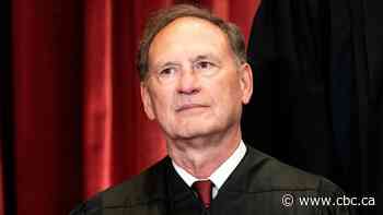 U.S. Supreme Court justice Alito blames wife for flying flag associated with Trump election deniers