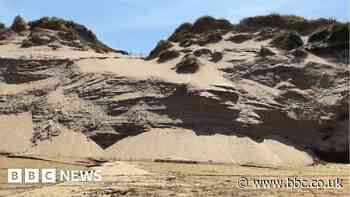 Shifting sand dunes threaten coastal communities