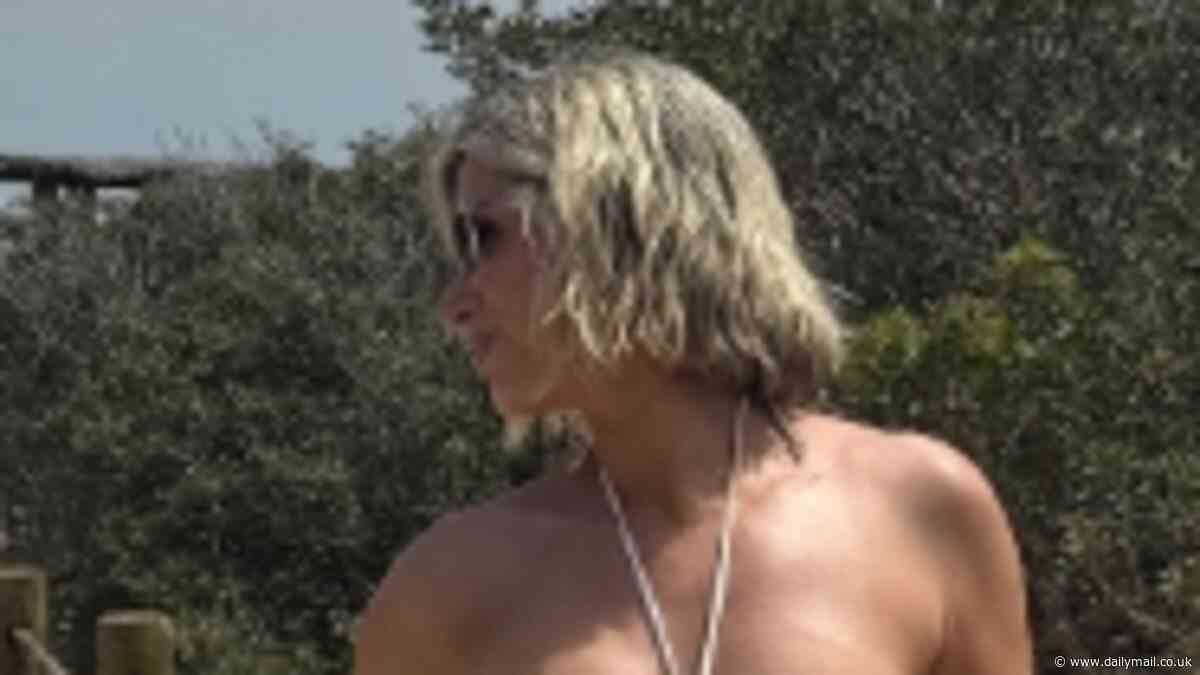 Sarah Jayne Dunn sends pulses racing in a skimpy black bikini as she shares an album of sun-soaked Ibiza photos
