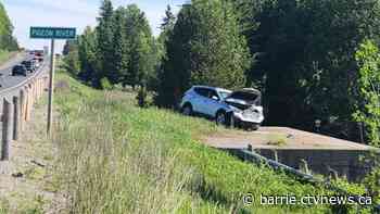 Driver charged after crashing through Highway 35 guardrail