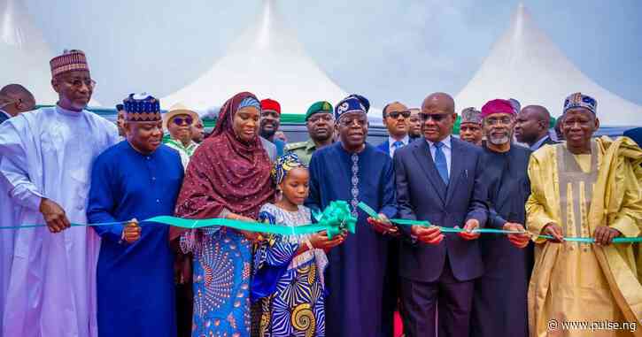 Tinubu thanks Wike for unwavering support as he inaugurates flyover in FCT