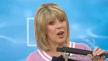 Ruth Langsford is still wearing her wedding ring as she brushes off Eamonn Holmes divorce for cheerful appearance on QVC after it was revealed work commitments 'took their marriage in different directions'