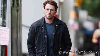 Chris Evans rocks a bespectacled look as he strolls through the New York City set of Materialists