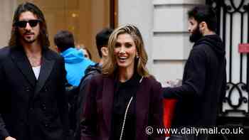 Who knew they were friends? Delta Goodrem and her rocker fiancé Matthew Copley have a catch up with a royal in London