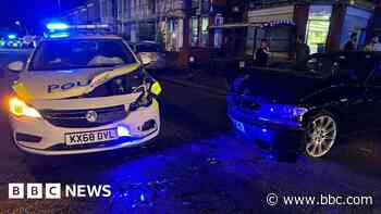 Police officer injured after car crashes with BMW