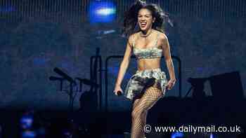 Olivia Rodrigo wows in tiny metallic bra top and mini skirt as she takes to the stage in Copenhagen