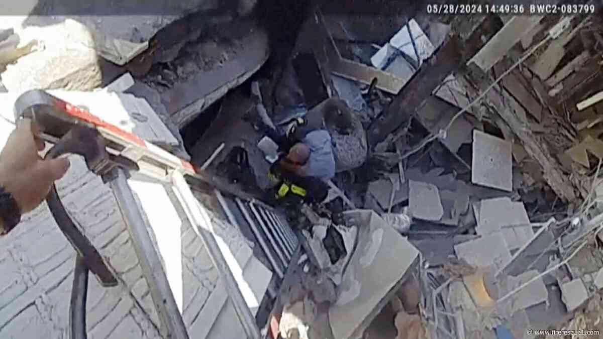 Watch: Ohio firefighter rescues victim from basement after building explosion