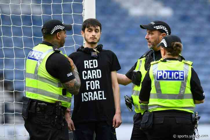 Protester ties himself to goalpost to delay Scotland-Israel women's football match