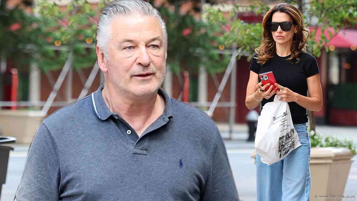 Alec Baldwin, 66, looks in high spirits during errand run with wife Hilaria, 40, in NYC - as it's confirmed he WILL go to trial for fatal Rust shooting