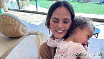 Chrissy Teigen, 38, shares heartwarming snaps enjoying fun in the sun with her kids... after getting candid about 'dark' times in her life