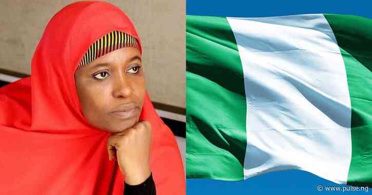Mixed reactions as Aisha Yesufu refuses to stand up for new national anthem