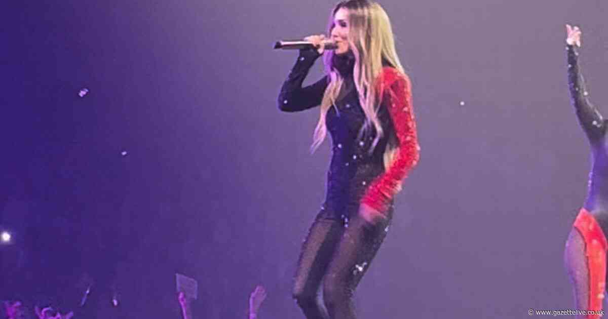 Cheryl almost falls off stage at Newcastle Girls Aloud gig as she's 'pulled' by fan