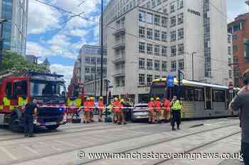 Manchester city centre tram crash LIVE as area taped off with firefighters on scene