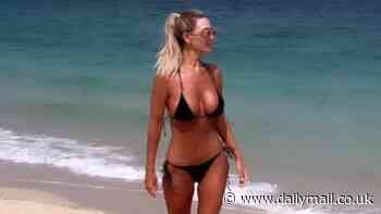 Christine McGuinness sends pulses racing in a TINY thong bikini as she hits the beach amid sun-soaked getaway