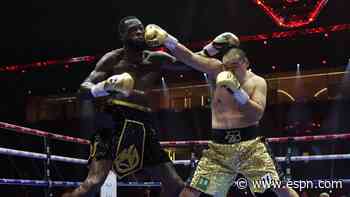 Zhilei Zhang defeated Deontay Wilder by fifth-round KO
