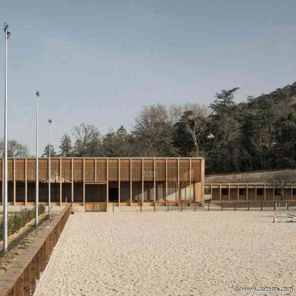 F+G Architectes creates "deliberately restrained" timber stable near Lyon