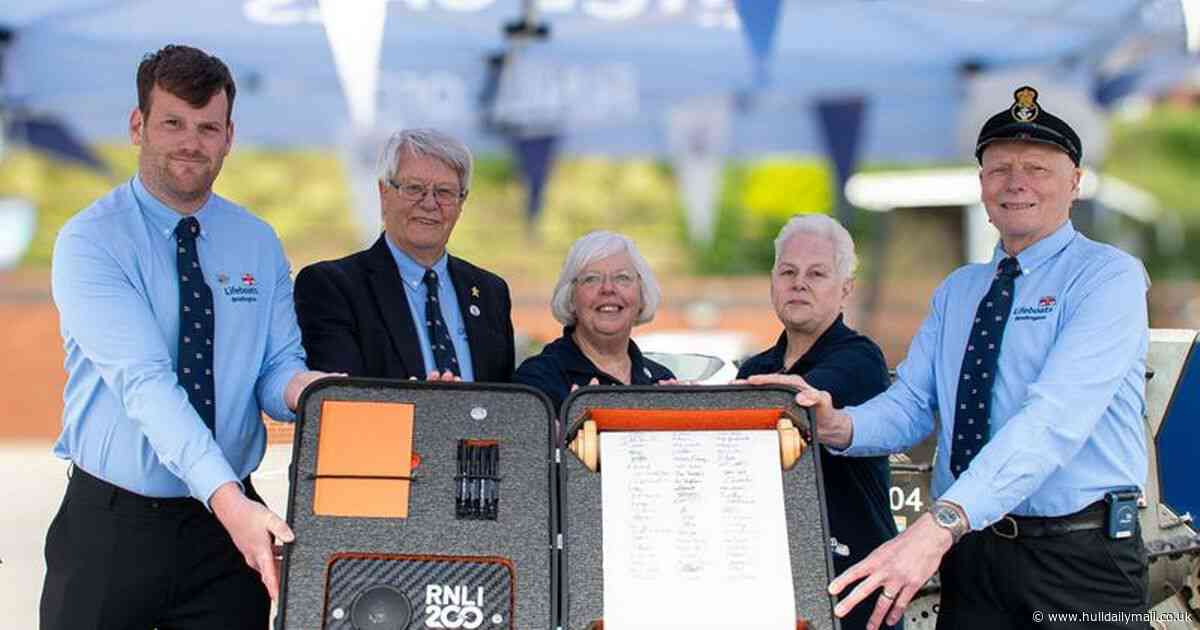 Bridlington RNLI lifeboat station welcomes anniversary scroll