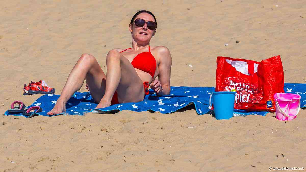 UK weather: Brits cross their fingers for a June heatwave - with sun-seekers packing out beaches and parks as temperatures rise above 20C