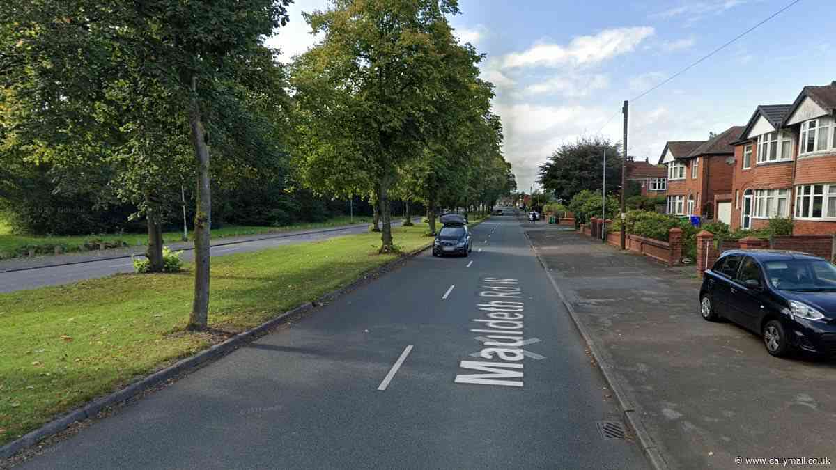 Woman, 22, dies after being hit by a vehicle in south Manchester - as two men, 18 and 20, are arrested on suspicion of causing death by dangerous driving