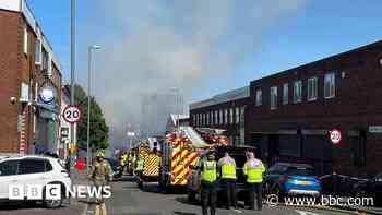 Explosions heard as 50 firefighters tackle blaze