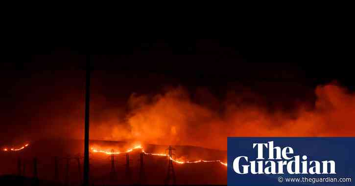 California firefighters battle wind-driven wildfire near San Francisco