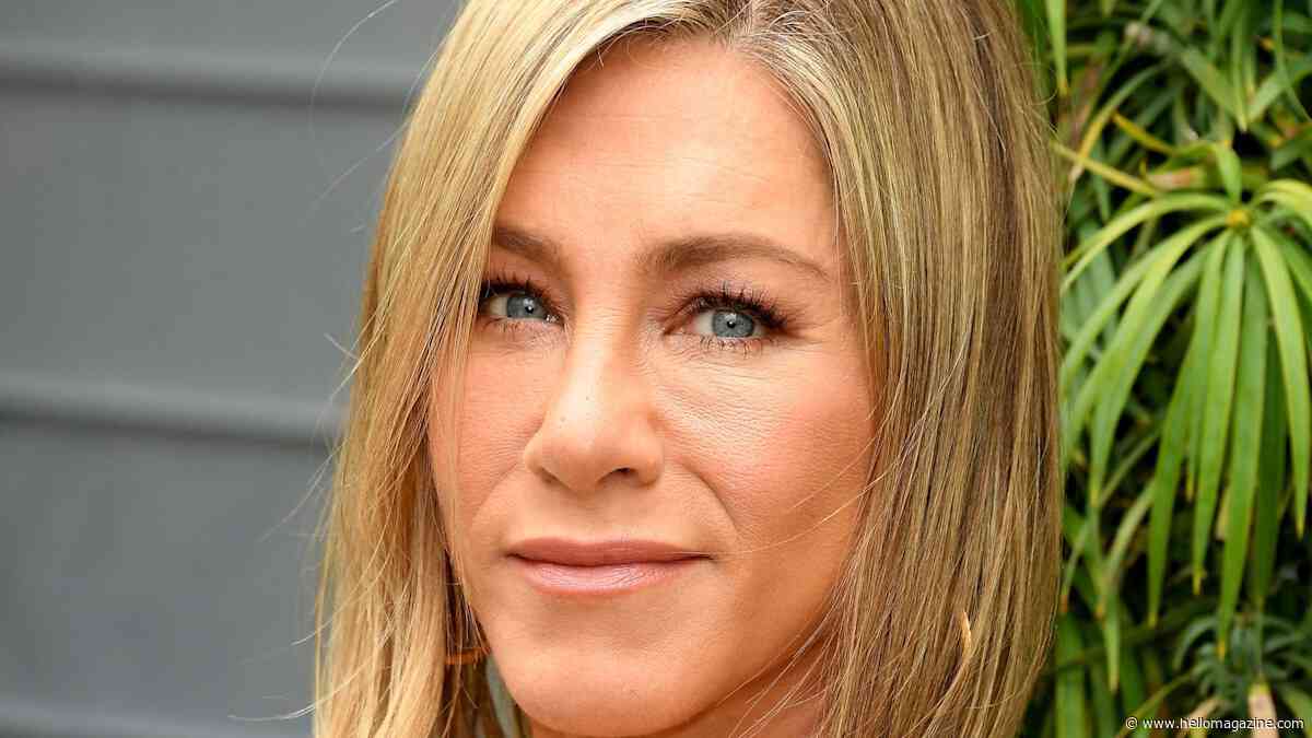 Jennifer Aniston showcases her incredible physique in tight-fitting red dress
