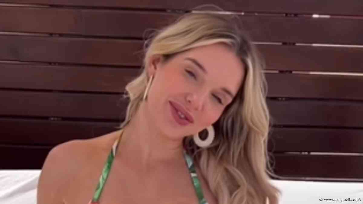 Helen Flanagan puts on a busty display in a skimpy floral bikini and admits she's 'feeling flirty' as she models Primark swimwear