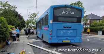 'Houses shaking' after bus swerves on to pavement and crashes