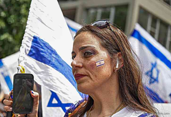 Bittersweet Salute to Israel Parade focuses on four words: Bring the hostages home