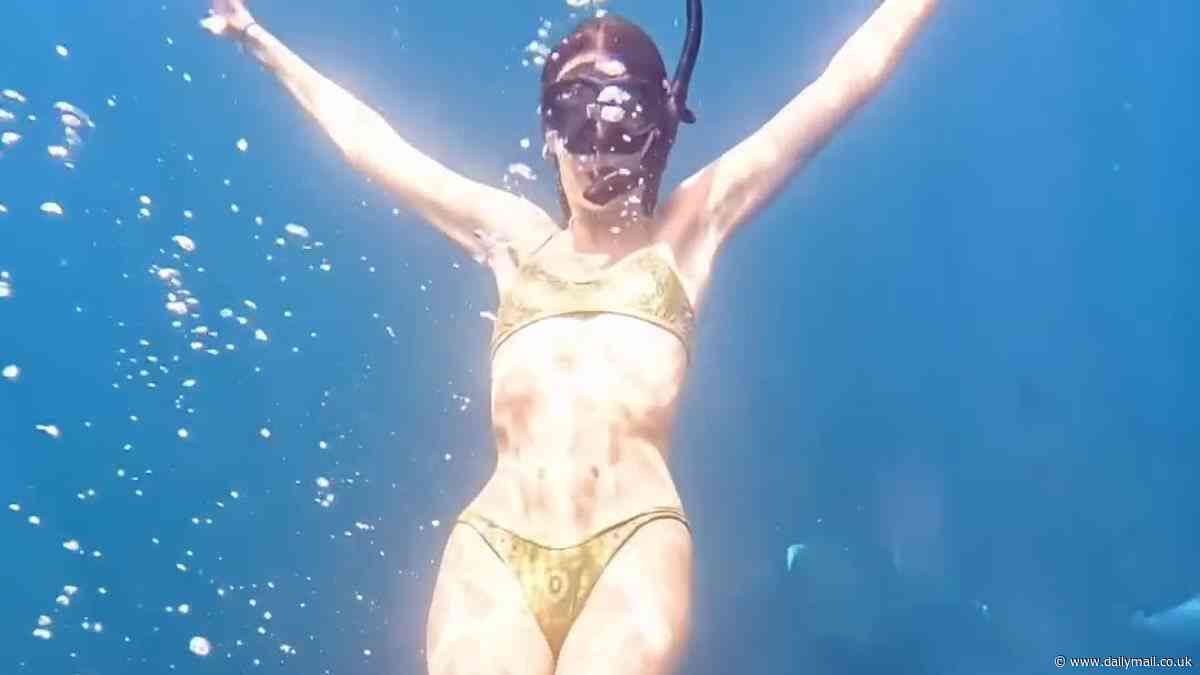Leonardo DiCaprio's girlfriend Vittoria  Ceretti, 25, stuns in a bikini as she shares highlights from her early birthday celebrations in the tropics