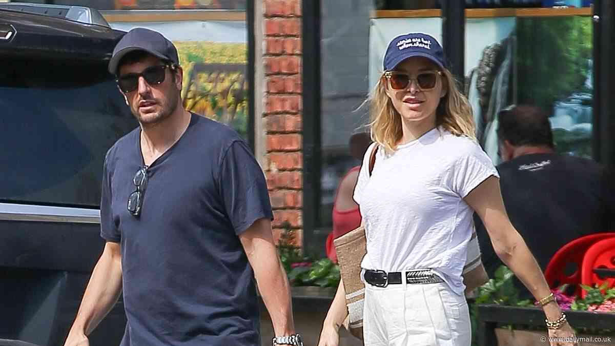 Jenny Mollen, 45, is seen for first time since undergoing a 'mommy makeover' (breast lift, fat transfer, and chin lipo) as she steps out with husband Jason Biggs in New York City