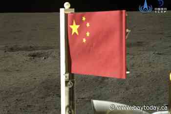 Craft unfurls China's flag on the far side of the moon and lifts off with lunar rocks to bring home