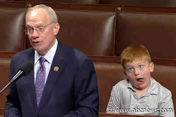 Congressman’s son steals the spotlight while his dad delivers remarks at the Capitol