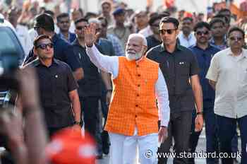 India election: Narendra Modi's BJP leads main rival in early vote counting