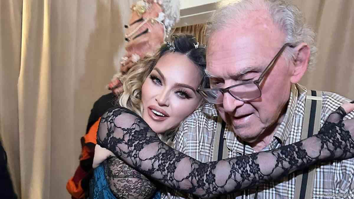 Madonna, 65, shares picture of herself giving her father Silvio a hug on his 93rd birthday as she thanks him for sharing his life mantra with her: 'I'm going to go until the wheels come off'