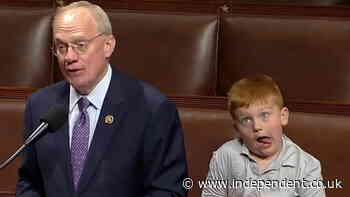 Congressman’s son, aged 6, pulls silly faces while father gives speech in House of Representatives