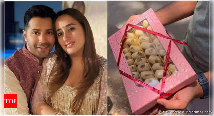 Varun Dhawan's staff treats paps with sweets