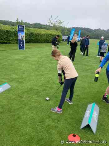 Oxfordshire girl tests 'world-first' golf prosthetic limb