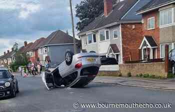 Woman taken to hospital after car overturns in Bournemouth